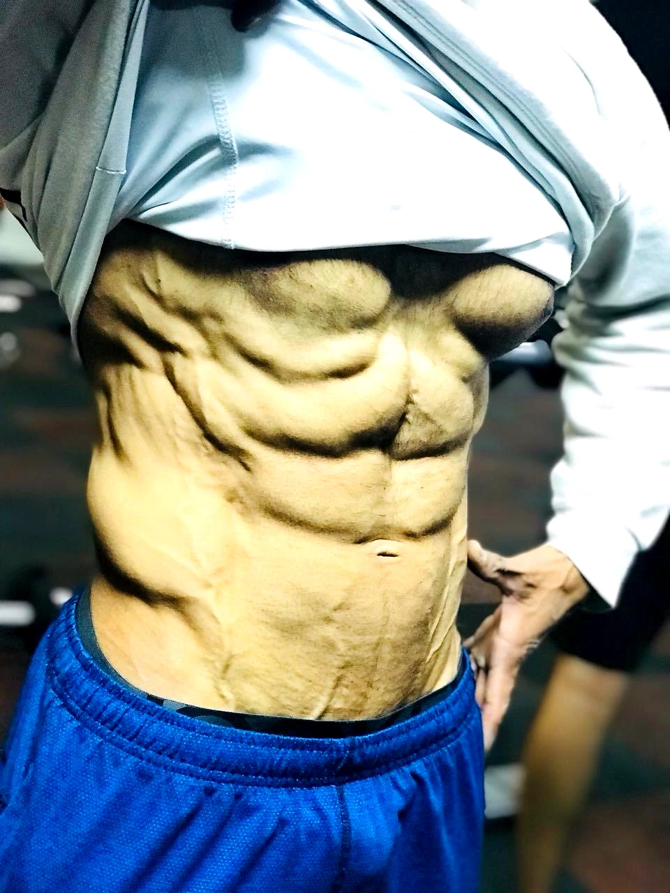 Abs definition — result of sustained fat loss